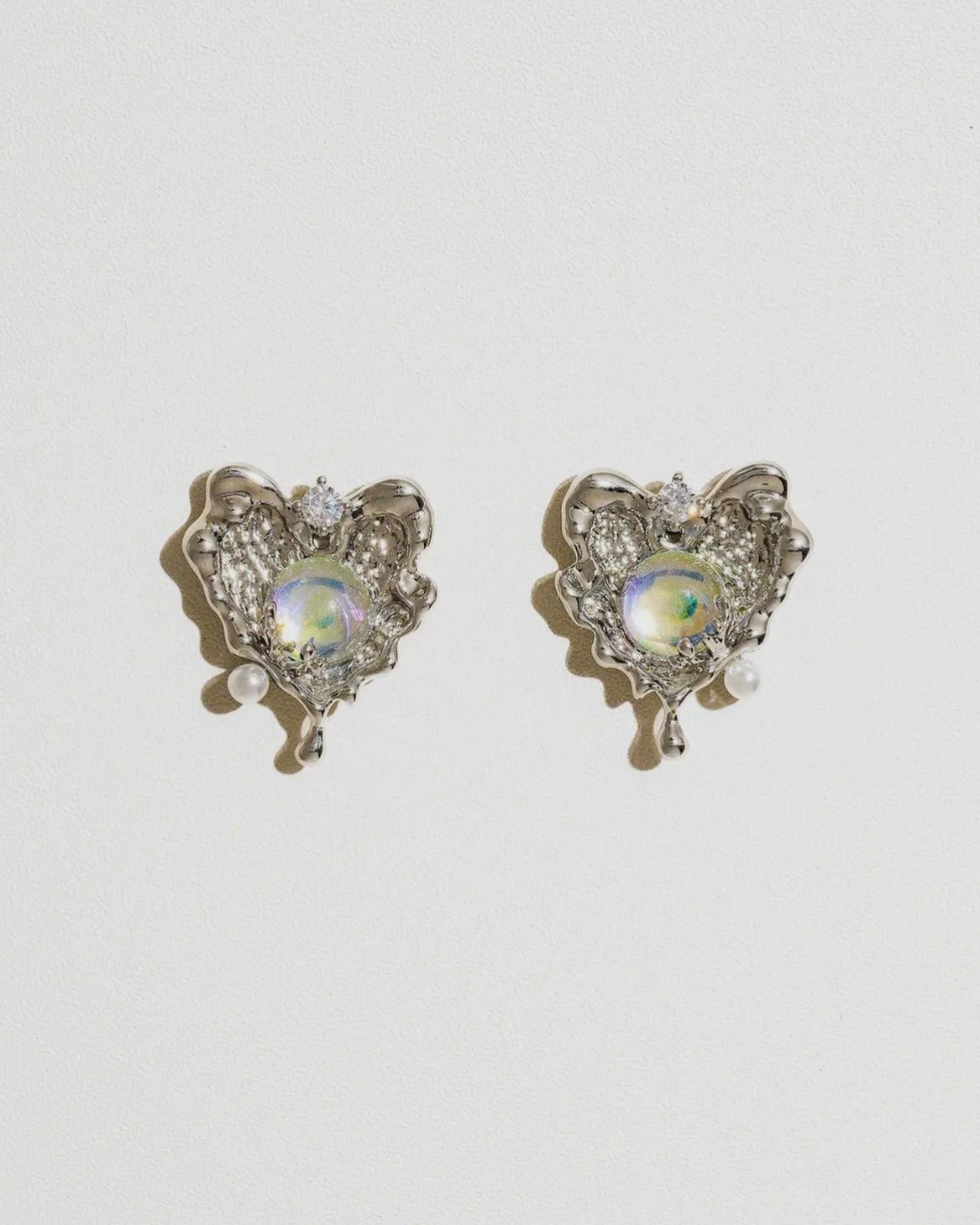 White Gold Melting Heart Studs